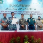 Proses pencanangan pembangunan akselerasi zona integritas menuju wilayah bebas korupsi (WKB) atau wilayah birokrasi bersih dan melayani (WBBM) di Kantor Pelayanan Perbendaharaan Negara (KPPN) Kabupaten Sidoarjo.