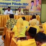 Bakal Cabup dan Cawabup Gresik, Yani-Alif, saat menggelar konsolidasi dengan keluarga besar Golkar Gresik. Foto: SYUHUD/ BANGSAONLINE