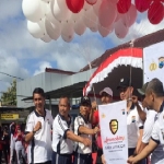 Polres Pamekasan ketika melepas balon sebagai tanda diresmikannya aplikasi Arek Lancor.