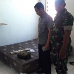 Kamar kos milik pelaku yang di dalamnya terdapat ganja seberat 5 kg yang telah dikemas.