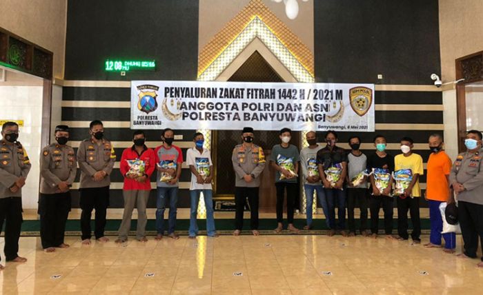 Polresta Banyuwangi Salurkan 1.475 Kg Beras Zakat Fitrah