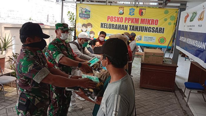 Gandeng Yayasan Buddha Tzu Chi, Koramil 0830/05 Tandes Bagi Ratusan Paket Sembako