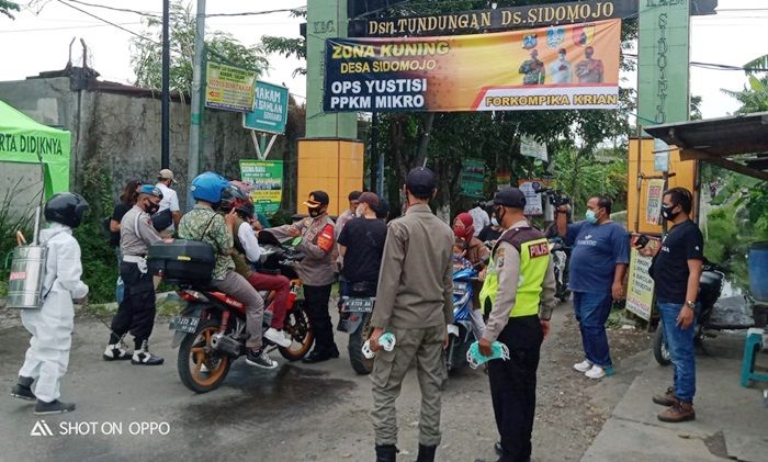 ​Hari Pertama PPKM Mikro, Polsek Krian Dirikan Posko Check Point di Zona Kuning