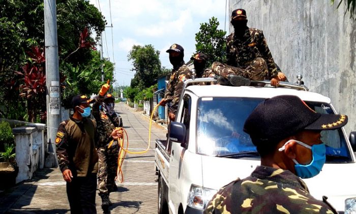 GP Ansor, Pemuda Muhammadiyah, dan LDII Gelar Baksos Penyemprotan Disinfektan