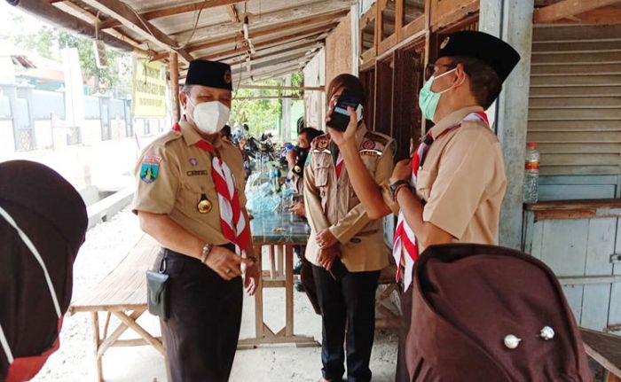 Gerakan Pramuka Bedah Rumah Mbah Riamah Melalui Program EJGSI