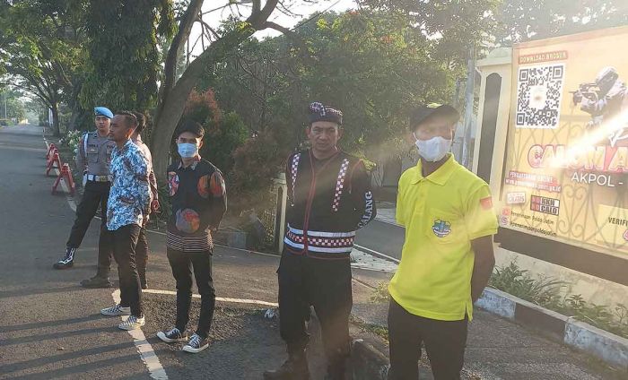 Bentuk Toleransi Beragama, Pecalang di Kota Batu Amankan Pelaksanaan Sholat Ied