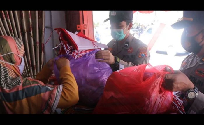 Polres Madiun Borong 2.550 Bendera Untuk Dibagikan Kepada Warga