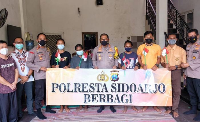 Jumat Berkah, Polresta Sidoarjo Berbagi Bersama Warga Papua