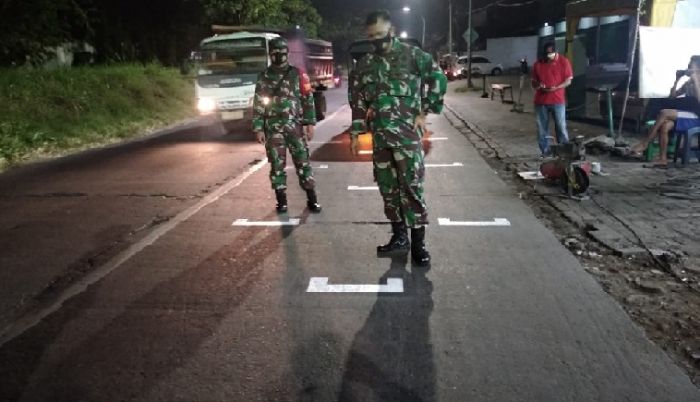 ​Bak Sirkuit Moto GP, Jalanan di Benowo Mulai Diberi Pembatas Jarak