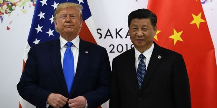 Donlad Trump dengan Presiden China Xi Jinping (Image: AFP via Getty Images)